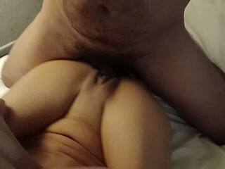 Fucking her with her legs up over her head