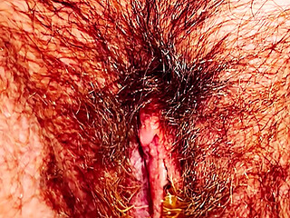 Hairy Pussy in Close-up Peeing a Yellow