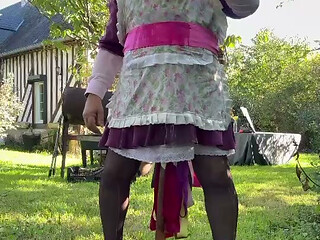 In gardener's outfit to take a piss shower with 4 bottles