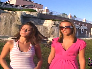 Two hotties on vacation streak across a golf course