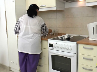 The bbw milf in the kitchen was very eager to be ass licking his booty