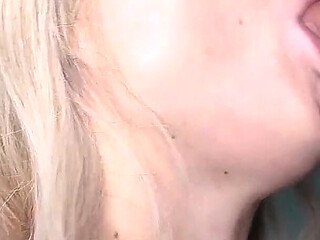 Blonde in Nylon Jumpsuit Makes a Beautiful Blowjob and Tears off Her Jumpsuit