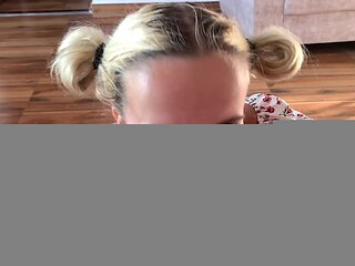 A blonde in pigtails has sex with her guy in reverse cowgirl