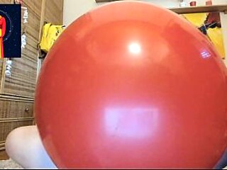 MILF Nicoletta gets tempted by giant red balloon in solo scene
