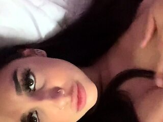 Busty babe playing with her big boobs