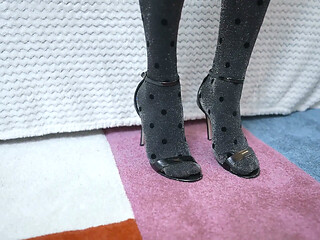 Mature Blonde MILF teases with glittery stockinged feet