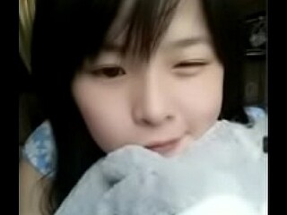 Cute Chinese girl shows off her adorable Asian moves in a high-class