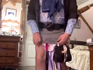 Dressed in a little gray skirt for an evening