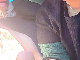 Mature sucking cock in the car