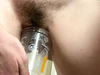Desperate MILF rushes back to hotel to do HUGE piss in a plastic cup! After filling it once, she strips naked to finish it off