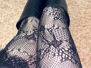 Long legs in black stockings snd boots