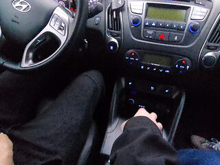 Amateur MILF gives a handjob to a taxi driver and teases him in the car, in public