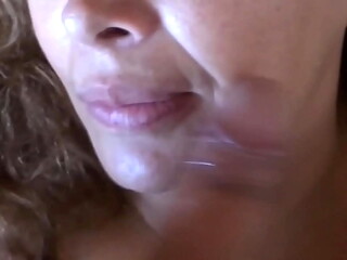 I put my cock in my stepmom'_s mouth and she starts sucking it until I cum