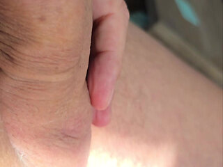 Jerking off in the on the couch in the sun