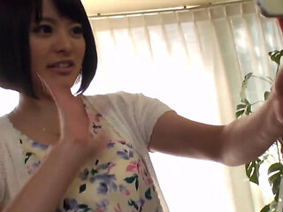 Vibrator keeps thick Asian's pussy as we as it can be