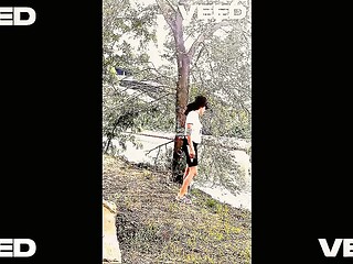 Public solo female masturbates in the backyard
