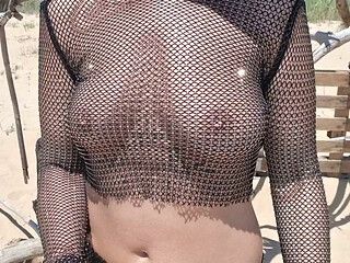 flashing tits and pussy on the beach