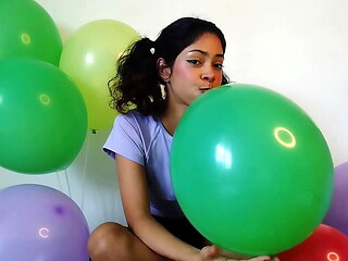 Pigtailed blowing and having fun