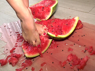 Busty MILF Presents Her Feet and Plays with a Watermelon