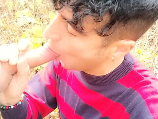 Taking friends cum on face in the park - sucking cock outdoor