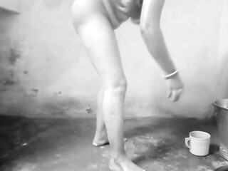 Shilpa Bhabhi looks so sexy in black and white, and shes teasing her pussy with a cucumber.