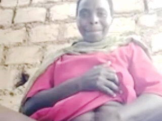 Hadzabe Tribe Mature Woman on Video Call with BF, Don't Ask Me Where She Got the Phone.