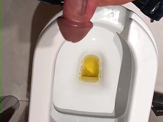 A cumm with a big cock in the work bathroom.