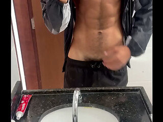 Hot hairy fitness hunk flashing his body in commando shorts