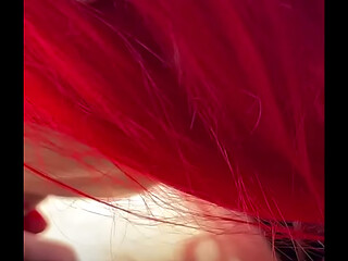 Redhead deepthroats thick BBC in the car, fingers gripping tight