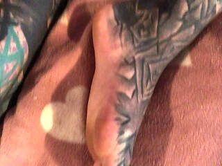Heavily tattooed and skinny solitaire flaunts her body