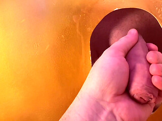 Young straight guy with a big cock at the gloryhole