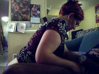Redhead With Glasses And Big Tits Giving A Long Blowjob To