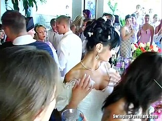Wedding whores give public blowjobs during a nasty gangbang