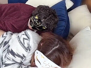 On the Sofa in Their Secret Room, They Shared Passionate Kisses Before Making Love, Expressing Their Deep Love.