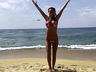 Monika Fox Poses In Pink Bikini With Stars On Beach