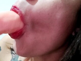 Latin babe with tattoo gives a hot blowjob