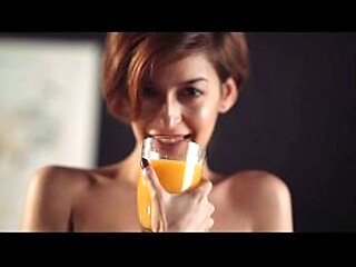 Busty redhead teases nipples while fully nude