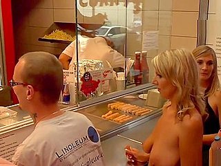 Naked blonde in line at fast food shop