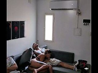 Hot Latina babe gets fucked on couch next to her boyfriend