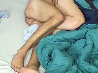 Fucking her pussy while she watches tv