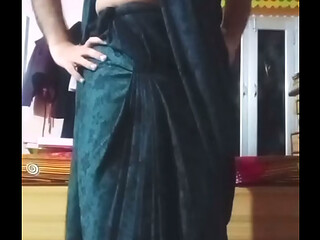 Indian Gay Crossdresser Bottom pressing and playing with her big boobs in black saree real homemade xxx sex