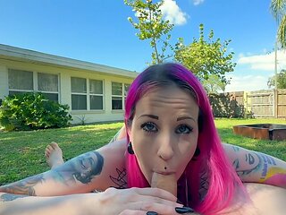 Tattooed temptress sucking cock outdoors