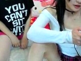 Japanese teens enjoys lesbian action