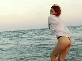 Justine, a Redhead Temptress