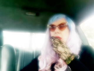 MATURE TG CD SMOKING MORES IN MY RIDE - LOTS OF DANGLING LONG CIGARETTES