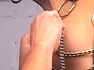 Insatiable MILF Submits to Chain Bondage Whipping