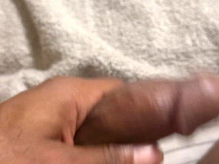 Big Black Dick Slowly Let's Cum Slime From The Head Off His Cock