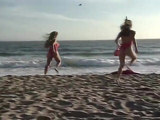 This tall redheaded lifeguard is showing her knockers and fucking her boyfriend