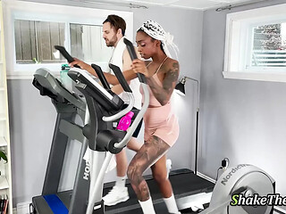 Tattooed ebony gets nailed in the ass by her trainer