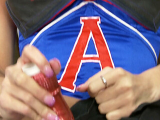 Cheerleader hottie shoves a fuck toy in her tight cunt